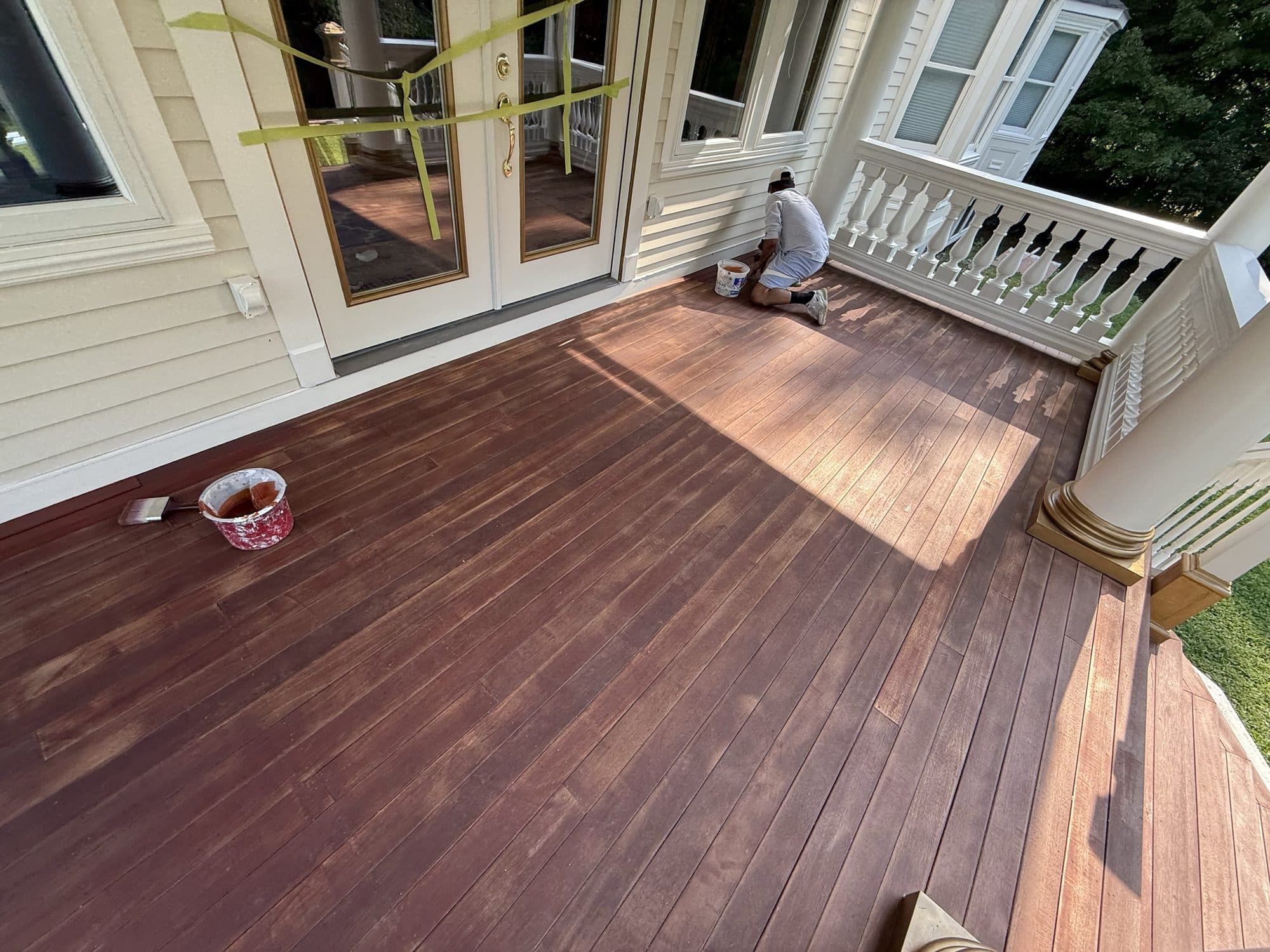 Porch decking halfway through staining