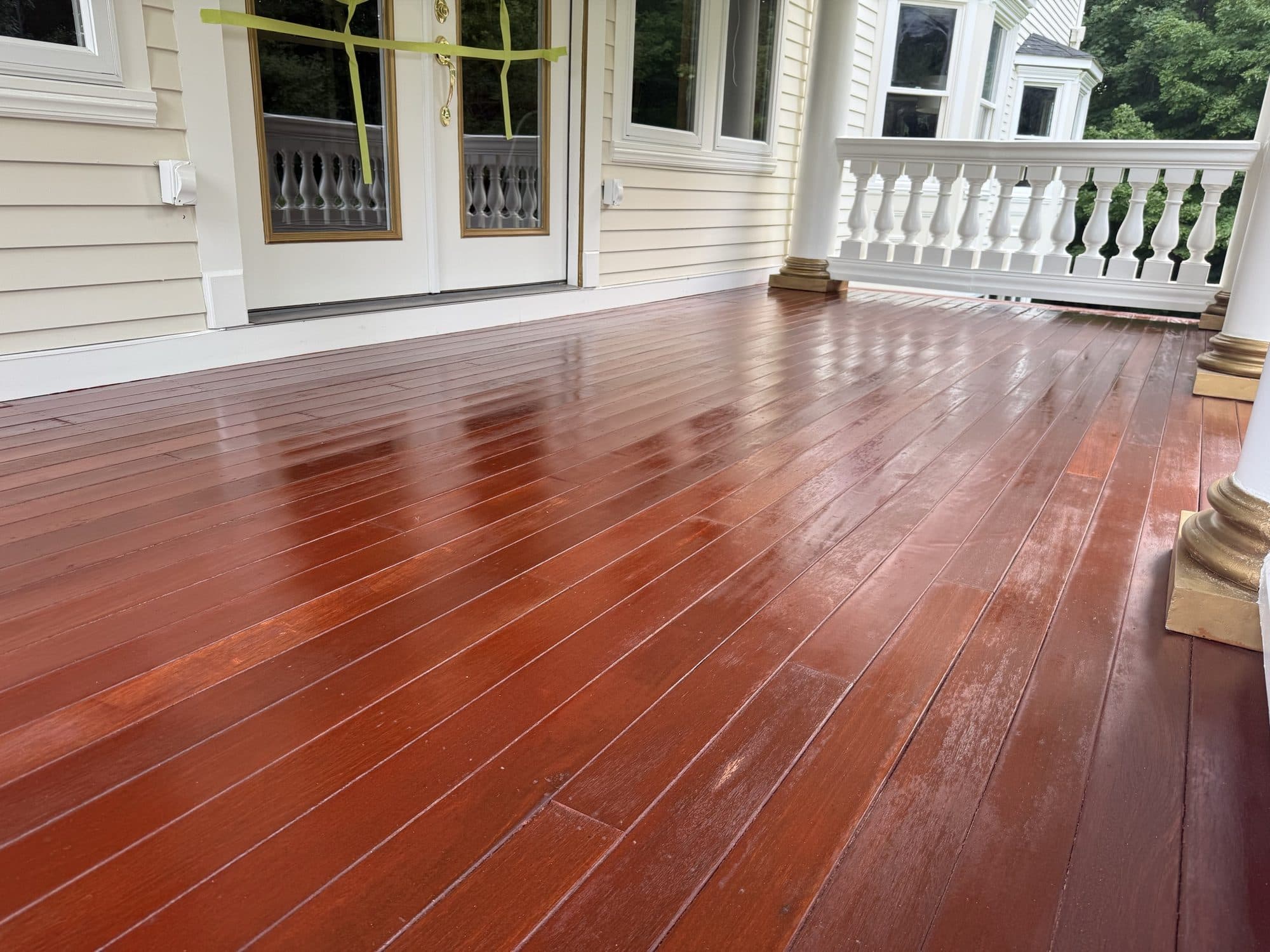 Mahogany porch decking after staining