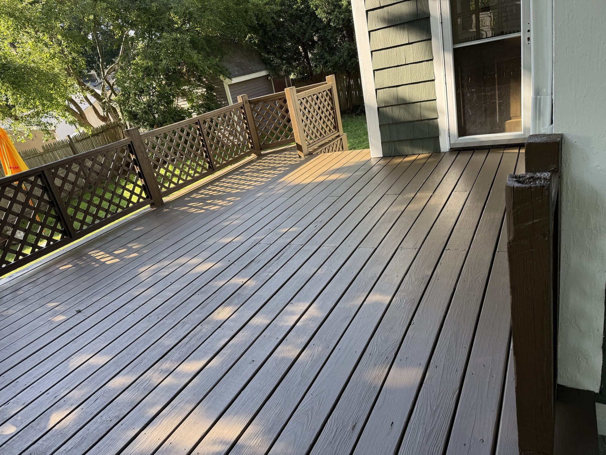Weathered deck boards before washing and staining